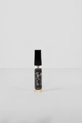 "7Perfumes Wild Cascade – The 5ml bottle featuring Tuscan Leather-inspired bold leathery and smoky notes, designed for sampling or travel."